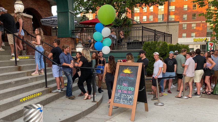 A line outside Harper's Restaurant &amp; Brew Pub on June 8, the night it reopened for indoor dining. At least 25 people who visited Harper's June 12 to 20 have been diagnosed with COVID-19.