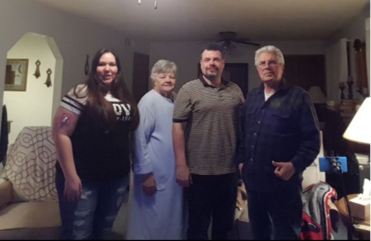 Heather Hulon (left) with her mother Joan (middle left), brother Anthony (middle) and their father Stoney (far right) during a visit in 2019 in Mesa, Arizona.