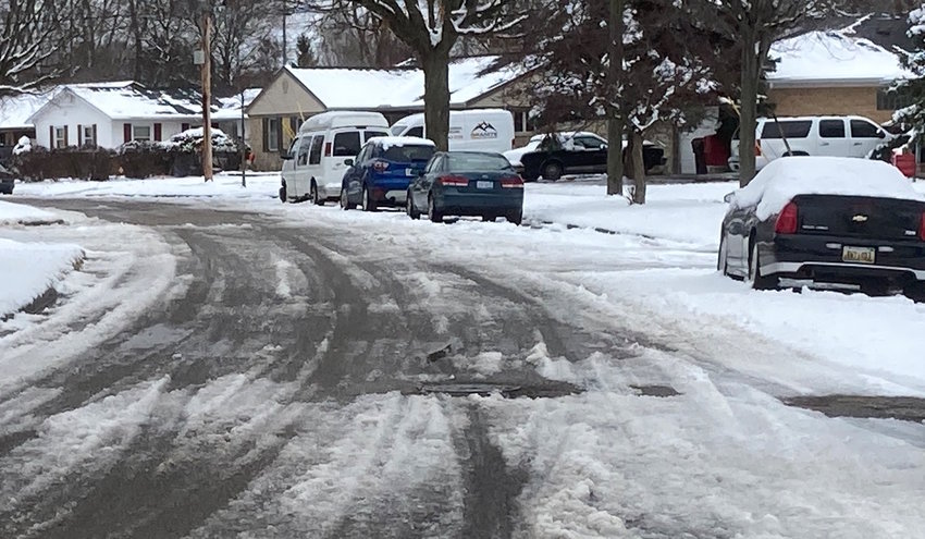 Lansing residents on Hillsdale Road were frustrated to see their street still covered in slush and ice on Wednesday, days after a winter storm blanketed the city in snowfall.