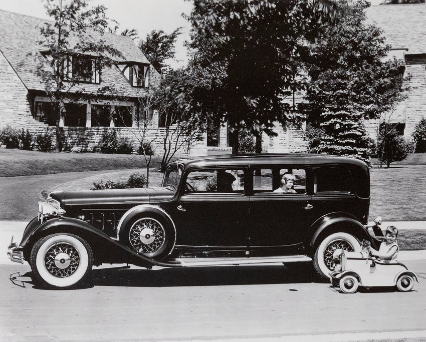 A wealth of archival materials in the Broad Museum&rsquo;s &ldquo;Interstates of Mind&rdquo; exhibit include this undated photo of an Oldsmobile in front of the Harper House in Lansing.