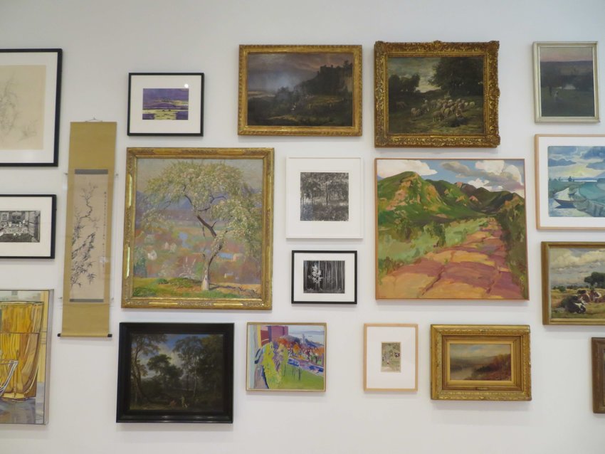 A wall filled with landscapes from The &ldquo;History Told Slant&rdquo; exhibit now on view at the MSU Broad Museum gives a taste of the museum&rsquo;s plan to permanently display thousands of objects from the Kresge Art Museum.