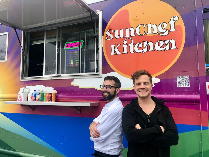 Chef Andon Grieve-McSweeney (left) and owner Mike Paski   outside of SunChef Kitchen food truck.