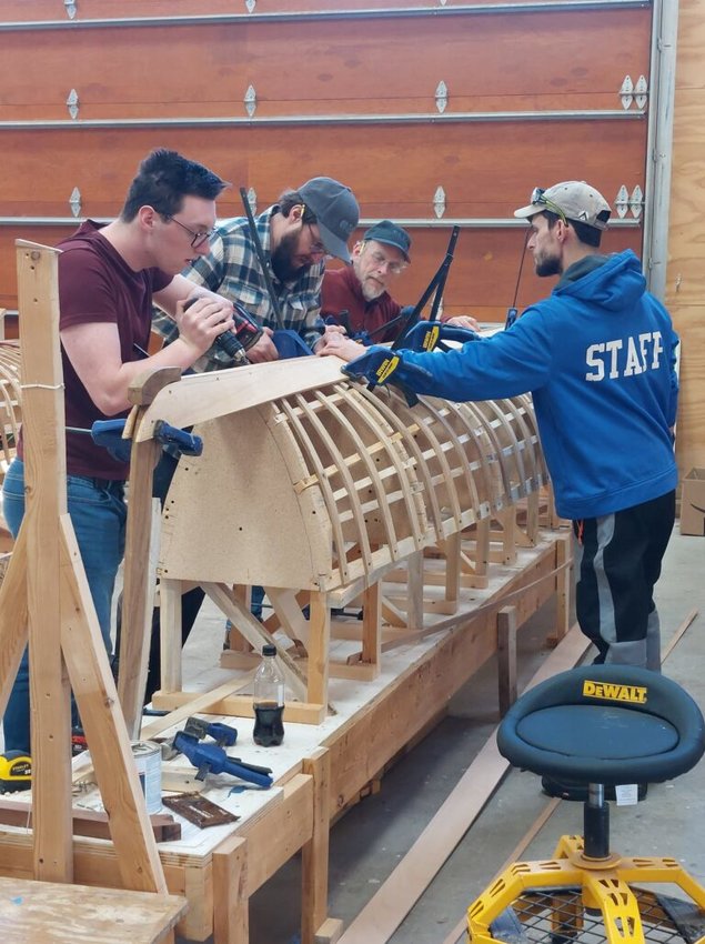 Students at the Great Lakes Boat Building School build a wooden boat, an iconic mode of transportation around Les Cheneaux Islands.