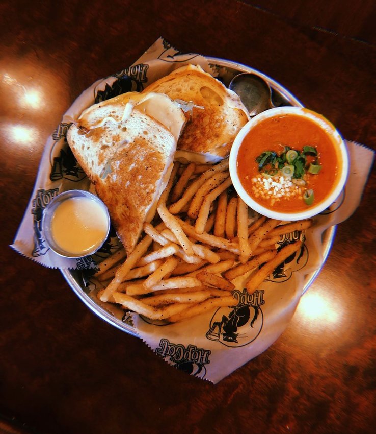The Madtown grilled cheese from HopCat, which is made with dill havarti, smoked gouda and muenster, goes great with Cosmik fries.
