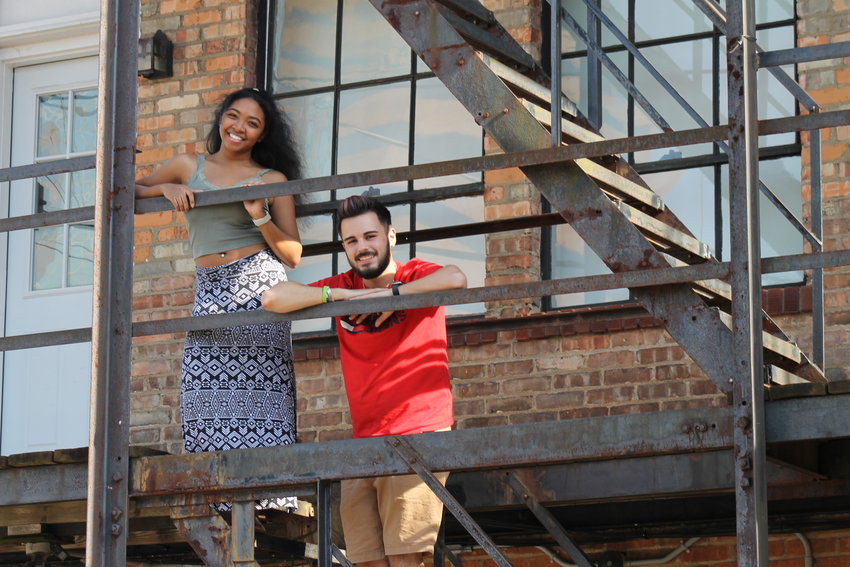 Tianna Leon, who portrays Anita in &ldquo;West Side Story,&rdquo; and Carlos Lenz, who plays one of the Shark gang members, on the fire escape where the show will be performed outdoors at 310 S. Grand Ave. It&rsquo;s located across from the Michigan Department of Health and Human Services.