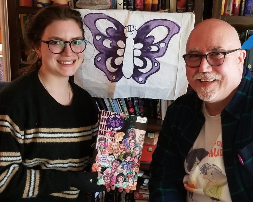 Isabel Clare Paul and Tim Retzloff with &ldquo;Come Out! In Detroit,&rdquo; a comic book they co-authored that commemorates the first gay pride march in Michigan 50 years ago.