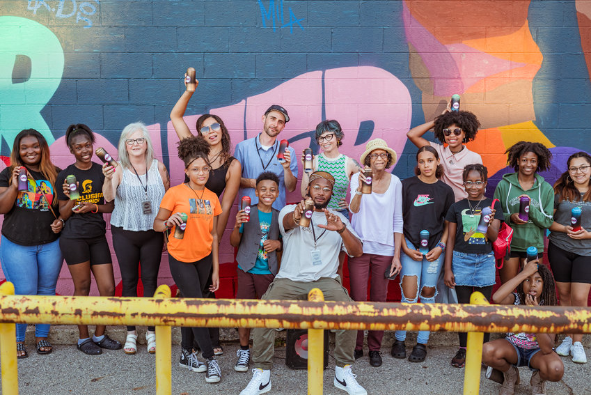 Artists and youth contributed their labor to create &ldquo;Creativity is a Superpower&rdquo; on a wall of the Capital Area District Library&rsquo;s downtown Lansing building.