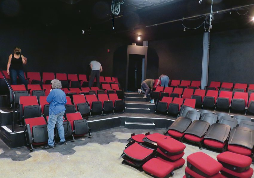 Williamston Theatre executive director Emily Sutton-Smith (upper left) and her colleagues painted the theater. They bolted down seats over the weekend to prepare for the Oct. 13 opening night of &ldquo;Magnolia Ballet, Part One.&rdquo;
