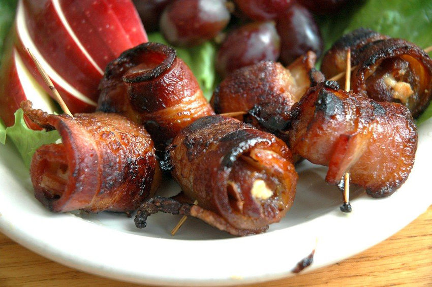 Bacon-wrapped, goat cheese-stuffed dates
