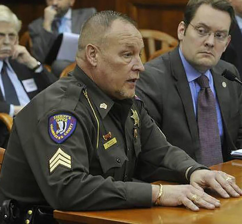 Shiawassee County Sheriff Douglas Chapman (left). City Pulse has been denied access to his personnel records, which it has sought as part of an investigation into how his 2018 drunk-driving arrest and conviction were handled.