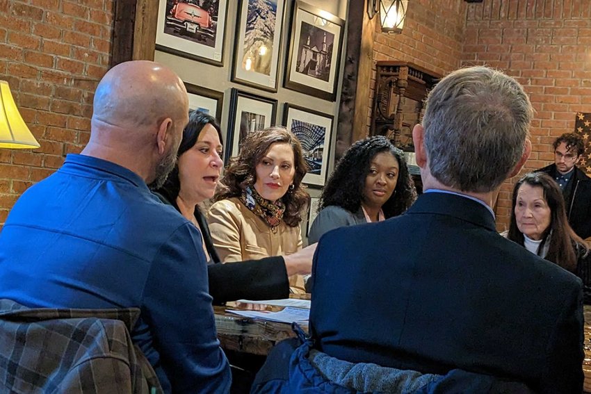 Gov. Gretchen Whitmer (center left) discusses taxes with state House Appropriations Chair Angela Witwer of Delta Township (to Whitmer&rsquo;s left) and Senate Appropriations Chair Sarah Anthony of Lansing (to Whitmer&rsquo;s right).