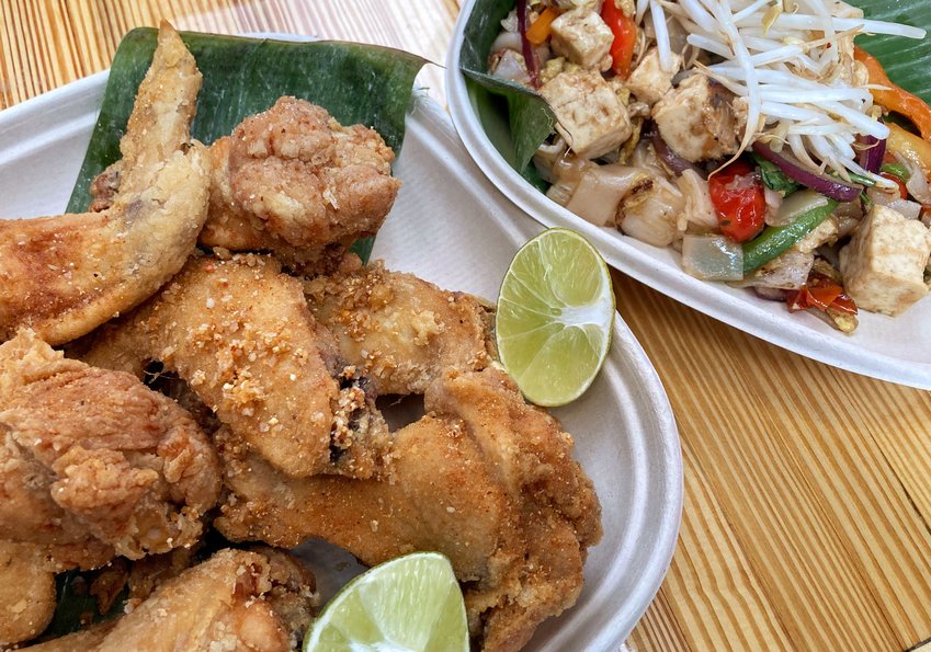 The laab wings at Kin Thai, located within Lansing Shuffle, are perfectly golden-fried and served with lime wedges to enhance the umami-rich seasoning.