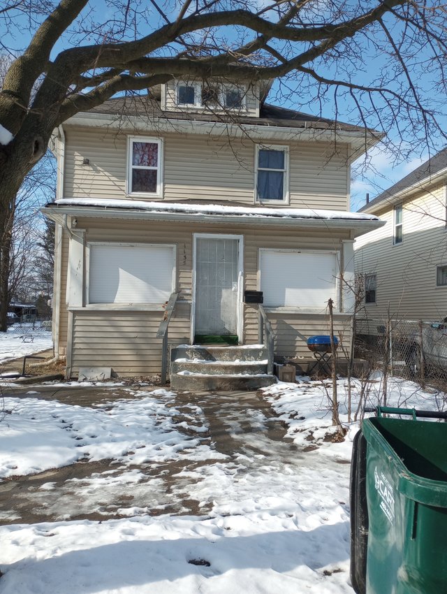 The city has ordered the residents of this house on Farrand Street in south Lansing, a family with six children, to vacate because the property is deemed unfair to occupy.