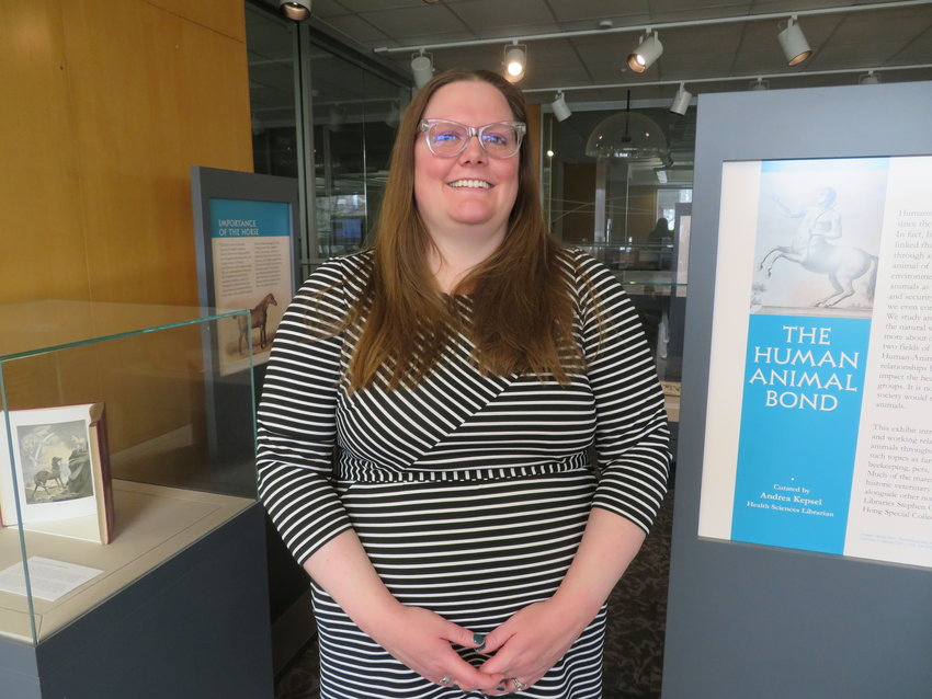 Andrea Kepsel, MSU Libraries&rsquo; health sciences librarian, curated an exhibit of rare books that explore the bond between animals and humans, on display at the school&rsquo;s Main Library.