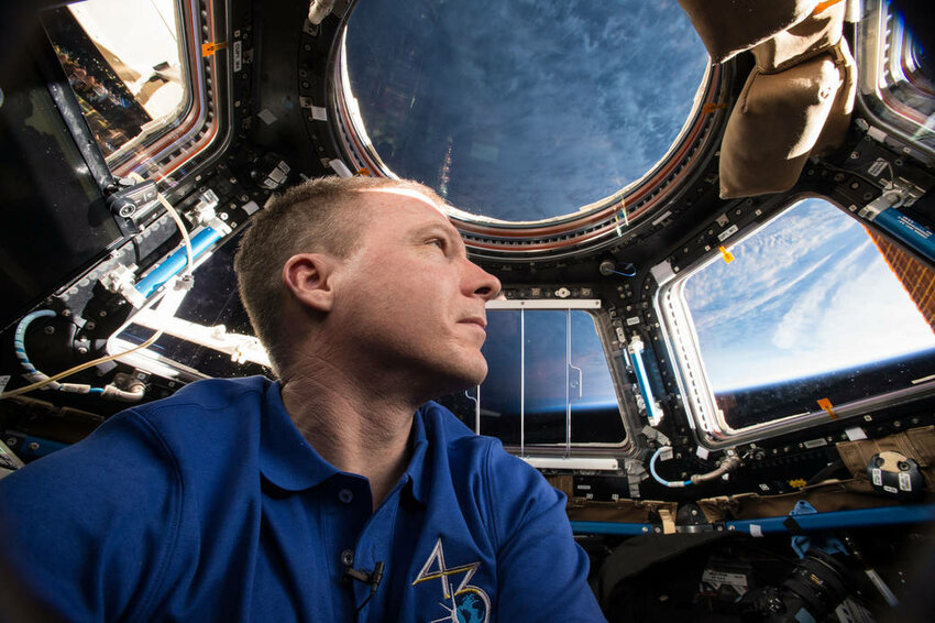 NASA astronaut Terry Virts, commander of the International Space Station&rsquo;s Expedition 43, enjoys the 360-degree view from the station&rsquo;s Cupola module, which he installed. Virts comes to the Wharton Center Sunday to talk about his experiences and share some of the 300,000-plus photos he took during the 200-day mission.