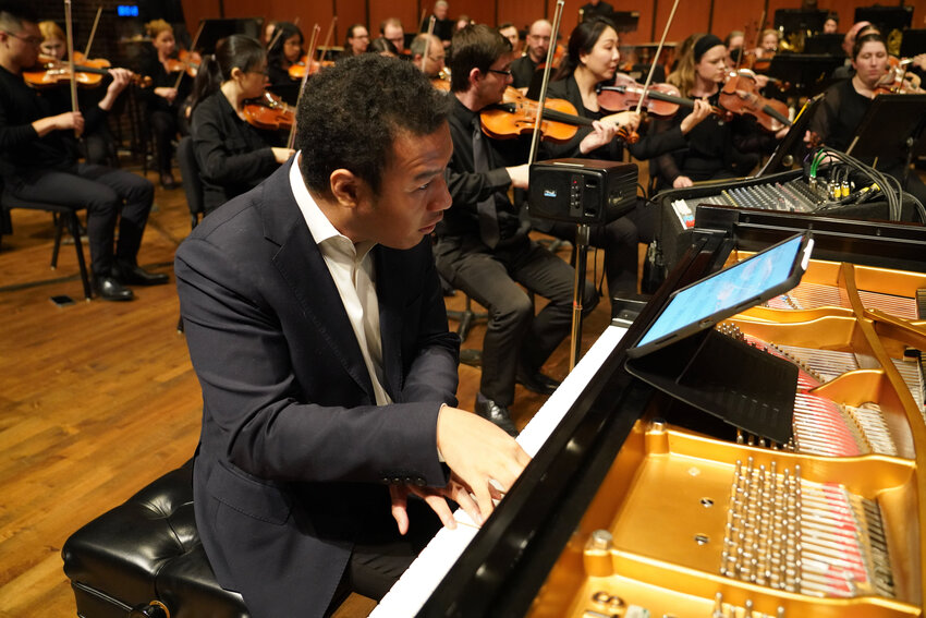 Pianist Clayton Stephenson dove into &quot;The Fourth Pedal,&quot; a world-premiere piano concerto by Lansing Symphony Orchestra composer-in-residence Patrick Harlin, at the orchestra's season finale Friday (June 2).