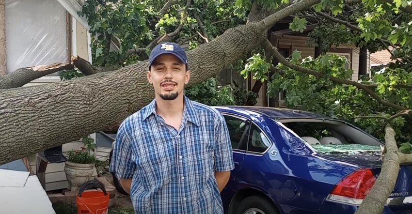 Clinton Mireles heard the storm that ripped through the city's east side around midnight Thursday. He described hearing a sound like &quot;an explosion.&quot; When he and his family went outside to investigate, they found a tree had fallen, damaging the corner of the roof of his front porch and crushing his Chevy Impala. The car was the family's only source of transportation.