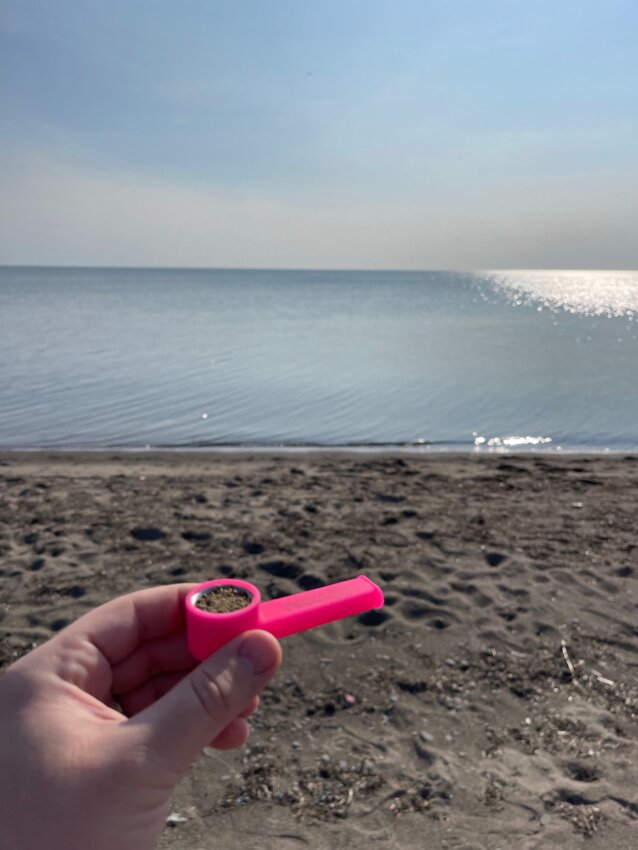 Smoking a bowl of Canadian cannabis on a beach in Hamilton, Ontario, Canada.