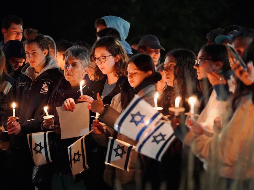 Michigan State University students and others gather for an on-campus vigil on Oct. 9, two days after Hamas&rsquo; attack.