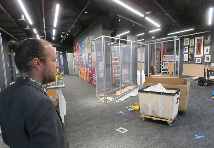 MSU Broad Art Museum interim director Steven Bridges checks out progress last week on the Center for Object Research and Engagement, or CORE, the museum&rsquo;s lower-level display space for art from its permanent collection.