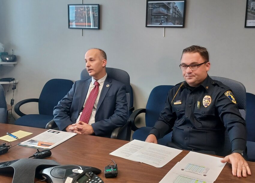 Lansing Mayor Andy Schor and Police Chief Ellery Sosobee announcing a wish list today of legislation to curb the availability of illegal guns.