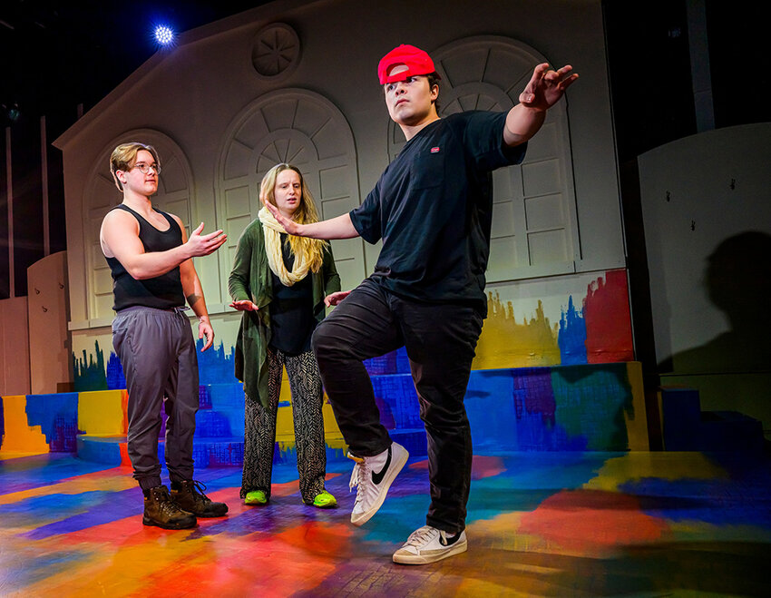From left: Lansing Community College students Christopher Chamberlain, Ashley Weinbrecht-Morris and Leo Ackerman perform &ldquo;Magical Fungi in Times Square,&rdquo; by Chantal Bilodeau, during the school&rsquo;s Climate Change Theatre Action festival.