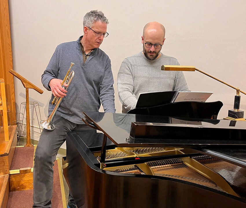 Trumpeter Neil Mueller and MSU associate professor of composition David Biedenbender do some last-minute work on &ldquo;River of Time,&rdquo; an ambitious trumpet concerto the Lansing Symphony Orchestra will premiere Friday (Jan. 12).