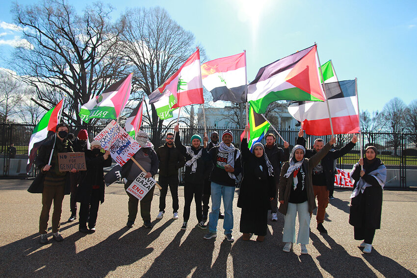 Lansing-area residents in front of the White House on Saturday for a national protest calling for a ceasefire in Gaza.