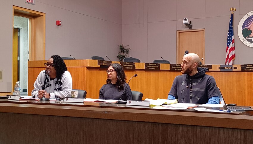 (From left) City Council members Tamera Carter, Trini Lopez Pehlivanoglu and Brian Jackson listen to public comment on a proposed Gaza ceasefire resolution at the Equity, Diversity and Inclusion Committee meeting yesterday. They voted 3-0 to send the resolution to the full Council, which is expected to vote on it on Monday.