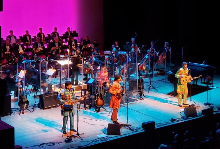 Beatles tribute group Classical Mystery Tour will be accompanied by the Lansing Symphony Orchestra at its show 7:30 p.m. Friday at the Wharton Center.