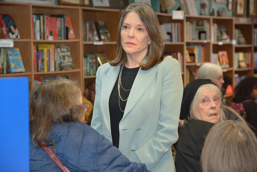 Lecturer, author and two-time former presidential candidate Marianne Williamson made her way into the audience to address a young Black veteran during her appearance at Everybody Reads bookstore last Thursday (Feb. 22).