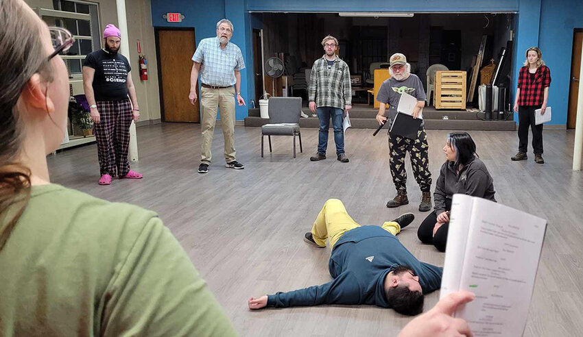 The cast of Ixion Ensemble Theatre&rsquo;s production of &ldquo;Playing for Real&rdquo; rehearses the show&rsquo;s hectic rehearsal scene.
