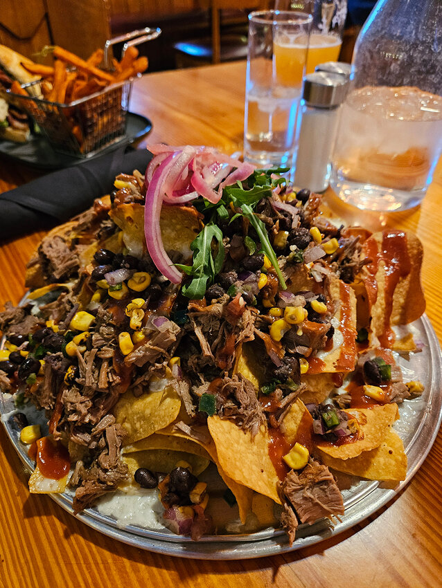 The Tipsy Nickel in Mason offers a formidable plate of brisket nachos.