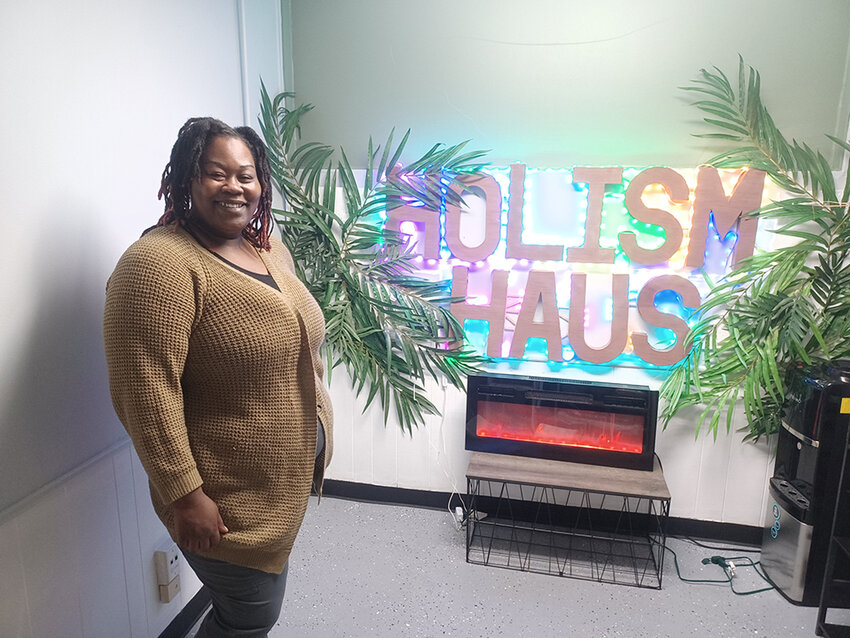 Maranda Houston, owner of Holism Haus, which opened April 1 in west Lansing, aims to help clients overcome trauma through sound-based meditation.