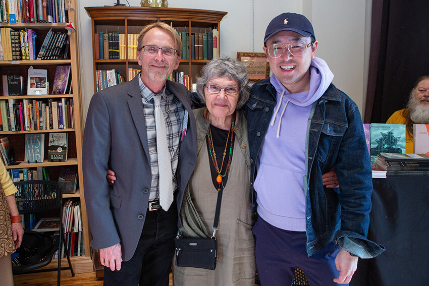 (From left): Dennis Hinrichsen, Ruelaine Stokes and Masaki Takahashi, three of Lansing&rsquo;s four poets laureate since the program started in 2017, at the Robin Theatre in REO Town last week at which Stokes accepted the symbolic laurel. The fourth, Laura Apol, was unable to attend.