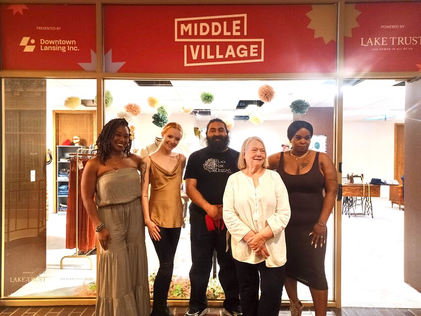 From left: Ashleigh Rogers of Sedona Wanderlust, Amara Hoddy of Hoddy Collective, Oscar Pe&ntilde;a of Black Rose Designs, Mary Toshach of Ornamaloo and Beeka Monique of CocoBella Boutique celebrated the grand opening of their Middle Village storefronts last Thursday (May 2).
