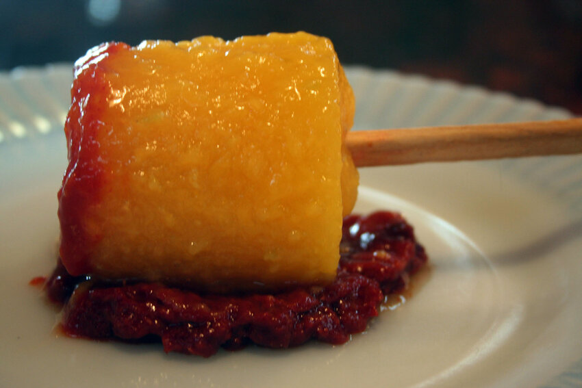 Mangonada, a frozen mango treat dipped in chamoy sauce, may be the best thing you try as the weather heats up.