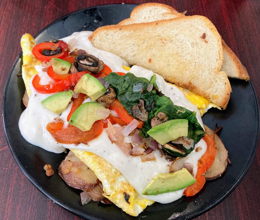 Arms & Embers Grill’s garden skillet packs a nutritional punch, perfect for vegetarians looking for a well-priced and energizing breakfast