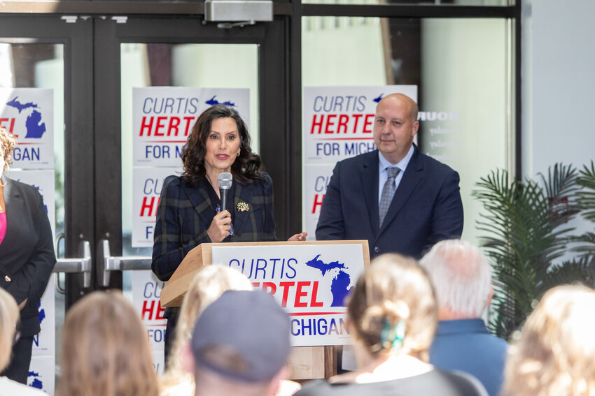 Gov. Gretchen Whitmer introduces congressional candidate Curtis Hertel Jr. today at a campaign event at the Lansing Shuffle.