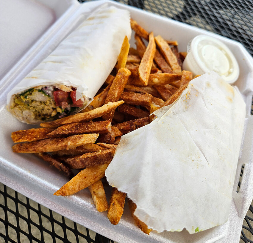 Noosh Afghan Cuisine’s chicken shawarma wrap. Not pictured: a surprise pickle!