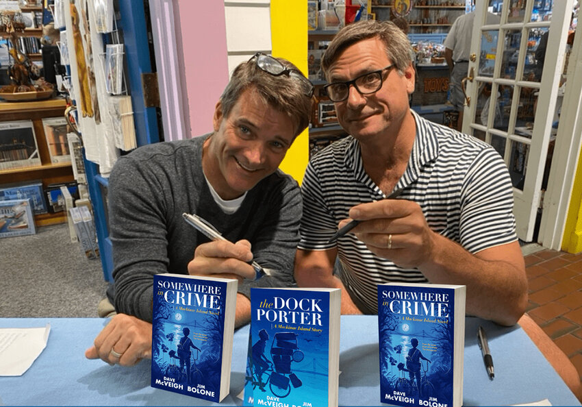 Like the protagonist of their three Mackinac Island novels, authors Dave McVeigh (left) and Jim Bolone were both dockporters in their youth.