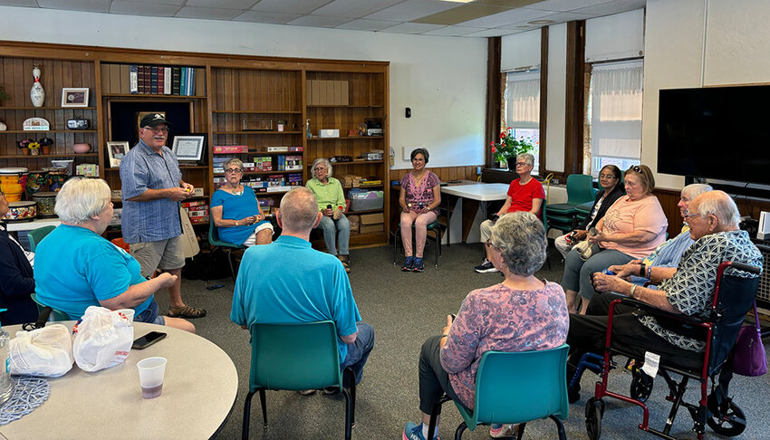 Seniors meeting at the Williamston Area Senior Center in the Commons of Williamston shopping mall. The center will move into bigger digs in the former Merindorf Meats store by the end of the year.