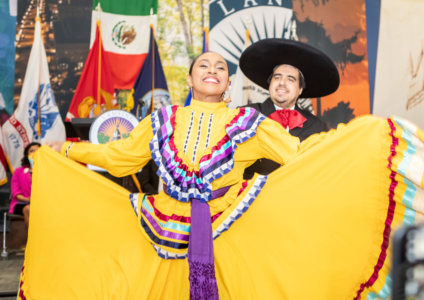 (From left) Lena Garcia and Jonah Brown of Ballet Maria Luz perform at Lansing's 2024 Hispanic Heritage Month ceremony at City Hall.