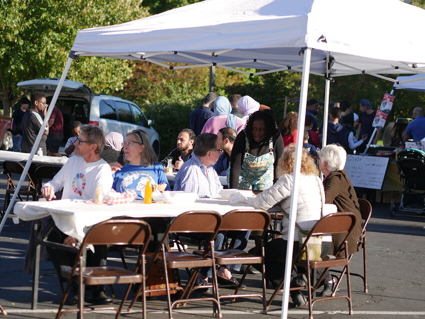 Courtesy Islamic Center of East Lansing  Guests enjoy dishes from various world cuisines at the 2022 Salaam Peace Festival.