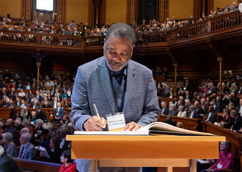 Courtesy photo  Rodney Whitaker signs the official book of American Academy of Arts and Sciences members on Sept. 21, joining such illustrious predecessors as Benjamin Franklin, Martin Luther King Jr. and Albert Einstein.