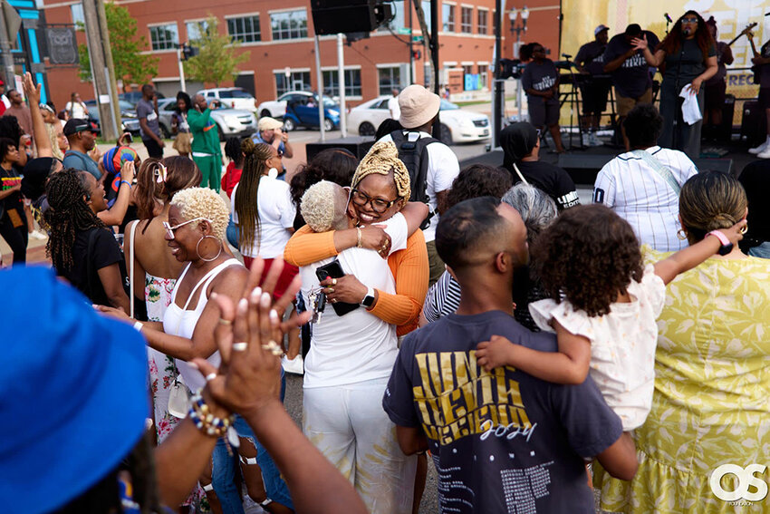 Patrons gather to enjoy live music at the 2024 517 Juneteenth Festival in REO Town.