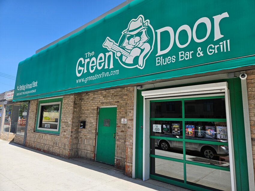 The legendary Green Door Bar &amp; Lounge, popular for live blues and other music at 2005 E. Michigan Ave. in Lansing, is for sale, owner Jen Costigan announced today.