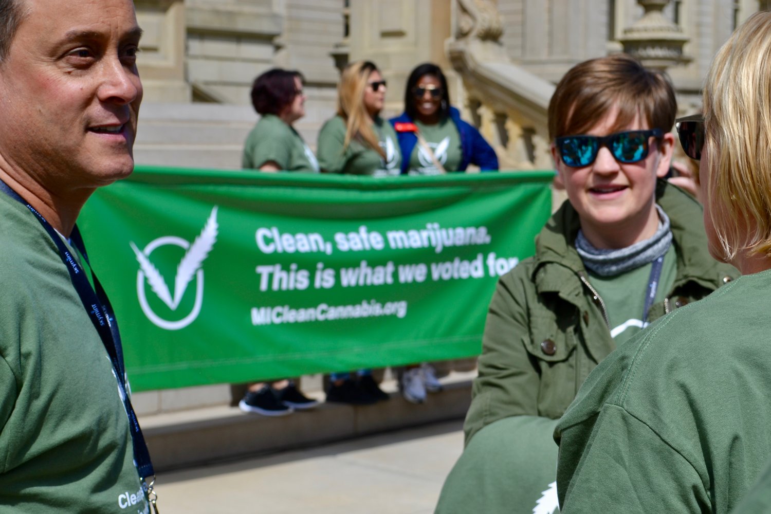 Green Peak Innovations CEO Jeff Radway (left) and his supporters at the Capitol Wednesday.