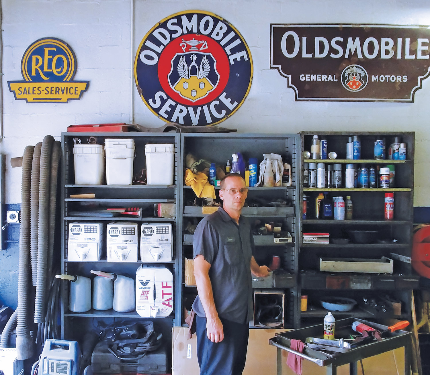 Co-owner of Badgley's garage Trevor Badgley specializes in Oldsmobiles.