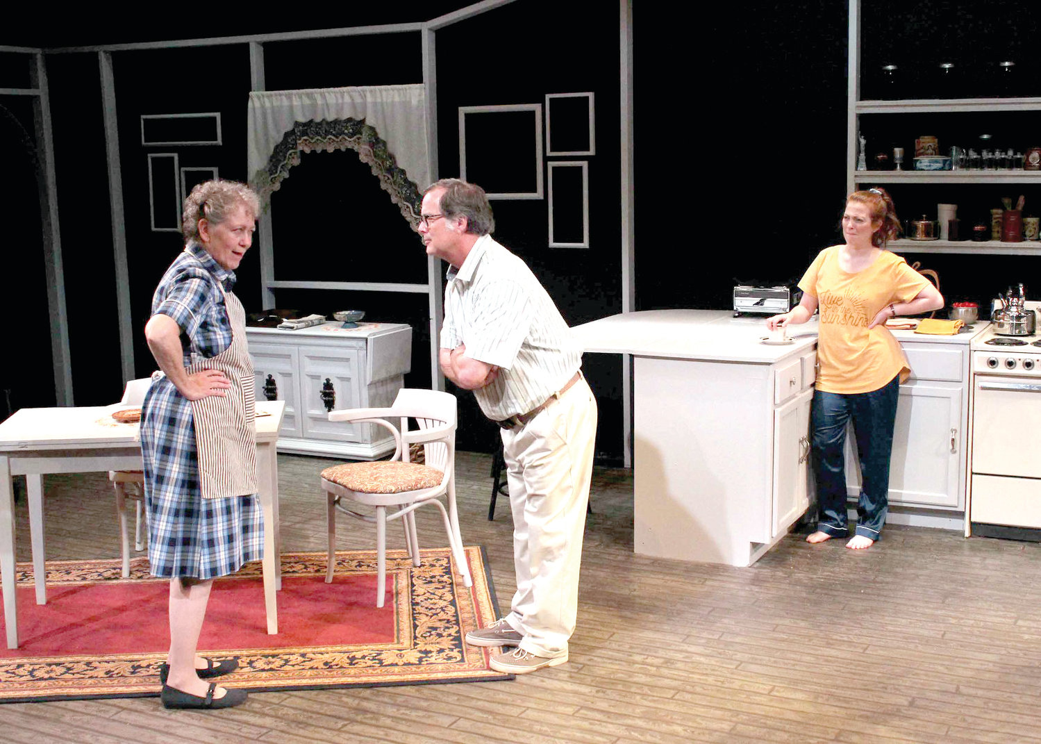 Tobin Hissong (center) plays Uncle Mathius, the caring and concerned son of an aging mother.